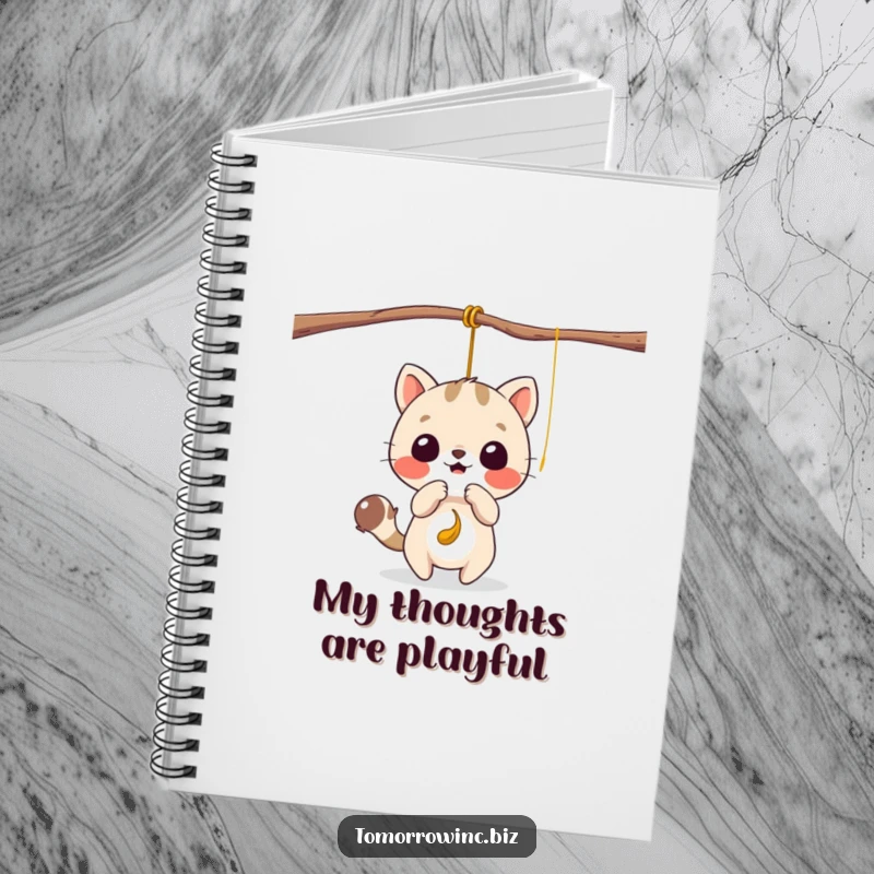 Funny notebook with a cute animal character playfully batting at a dangling, tempting string, perfect for jotting notes.